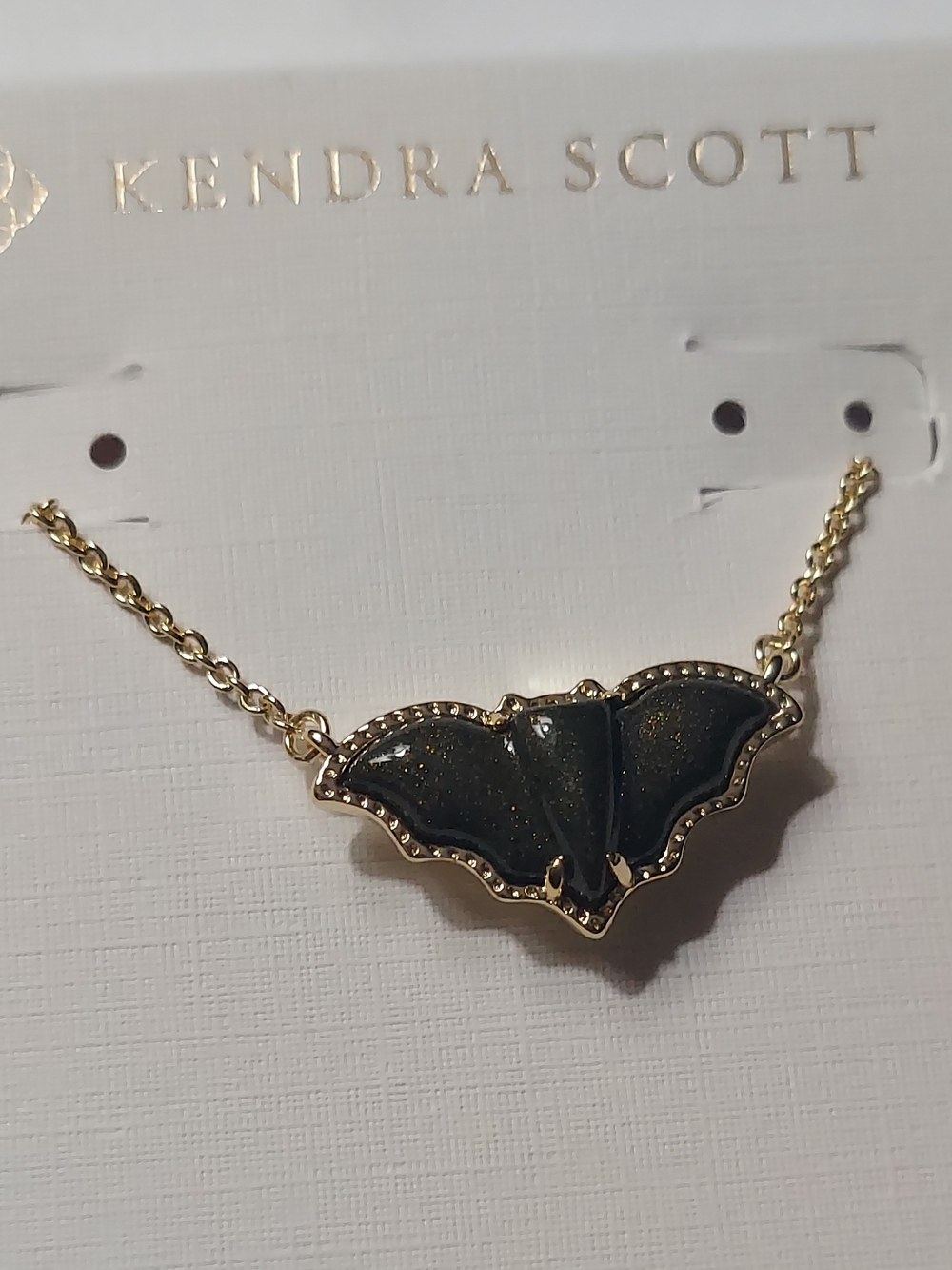 Kendra Scott Gold Chain Necklace with Black Sparkle Bat Pendant